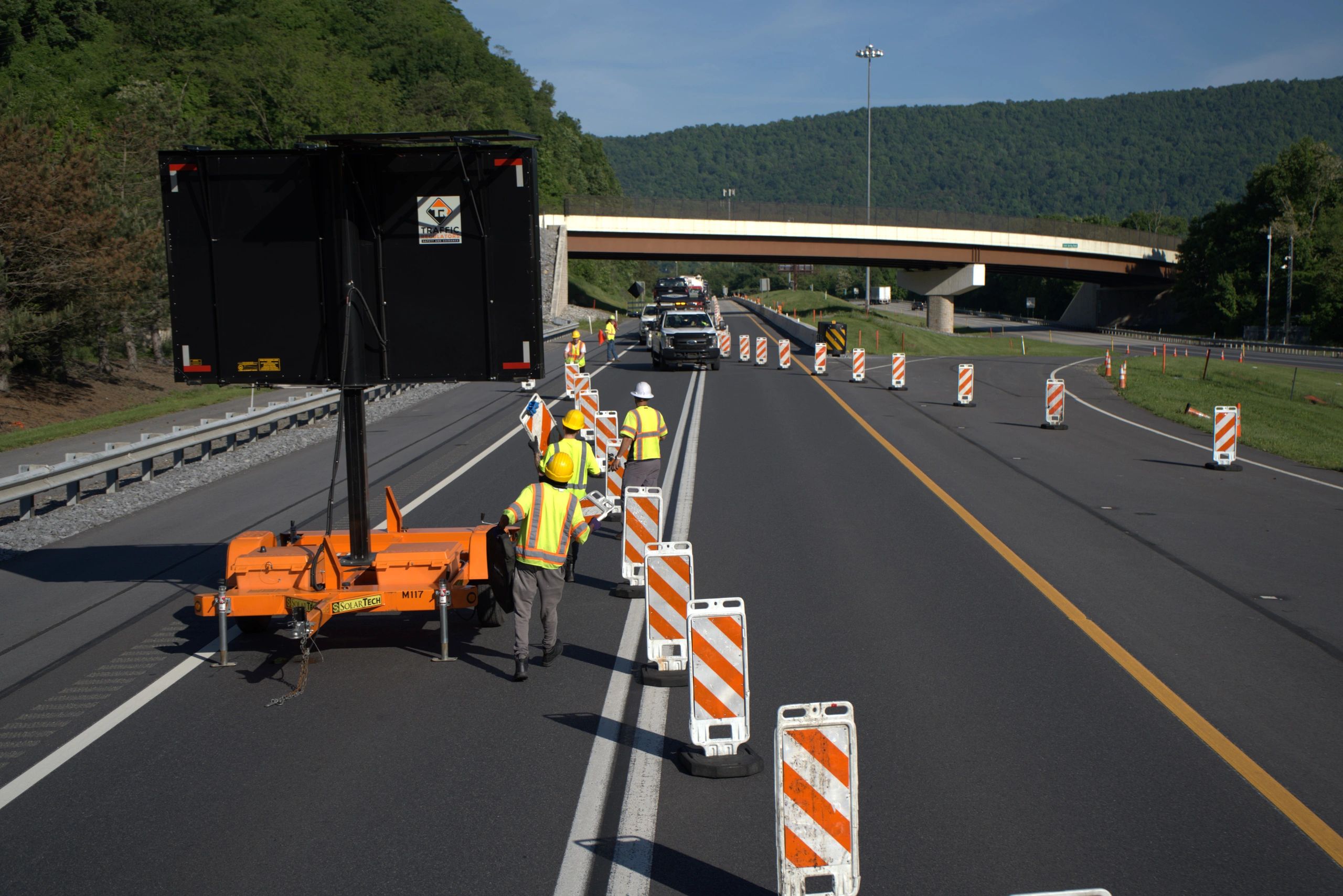 Traffic Regulators crew establishing a highway lane closure
